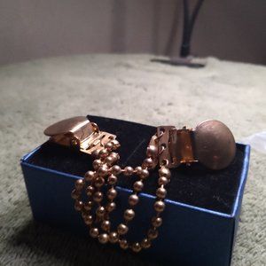 Copper color tie clip